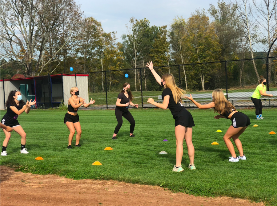 Nonnewaug seniors demonstrate teamwork skills during the water balloon toss at Senior Field Day 2020.
