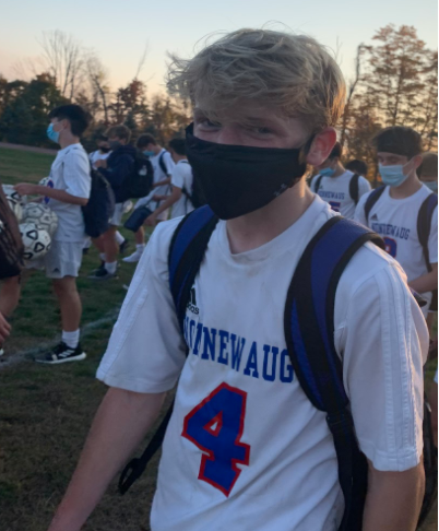 Nonnewaug sophomore Andrew Greene wears a mask after a soccer game in Terryville. Masks have become part of everyday life, especially in schools, during the COVID-19 pandemic, but they still arent enough to get Nonnewaug students back to school full-time. (Dylan Chung photo)