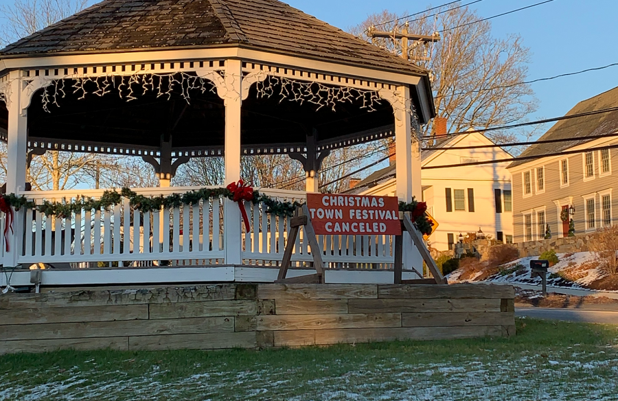 A sign on the Bethlehem Town Green informs residents that the annual Christmas festival was canceled due to COVID-19 precautions.