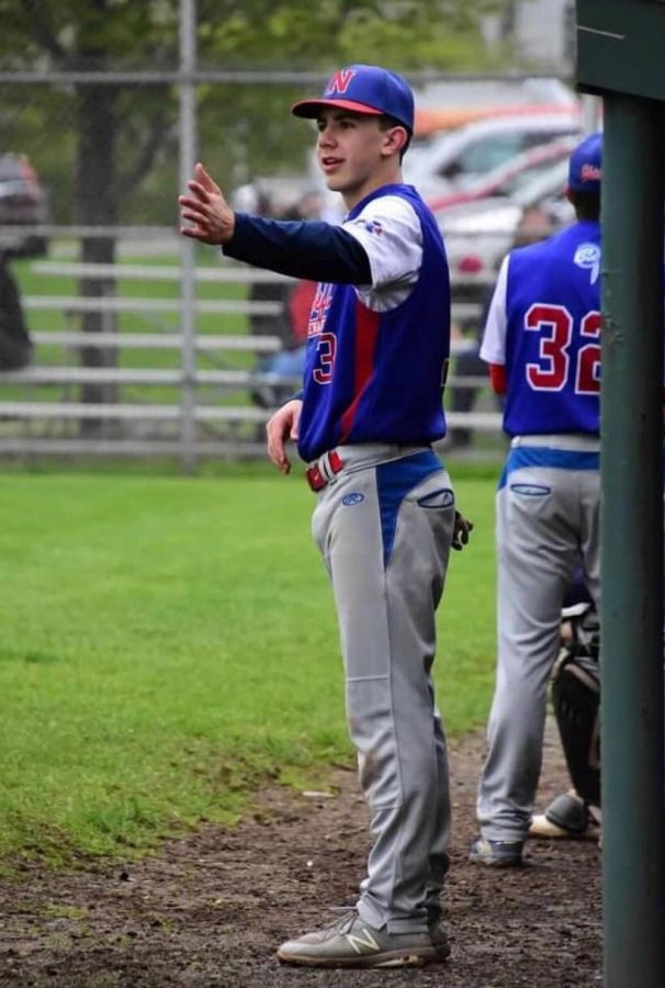 Ryan Tomkalski reaches out for a high-five during one of Nonnewaugs baseball games in 2019. The Chiefs 2020 season was cancelled due to the COVID-19 pandemic.