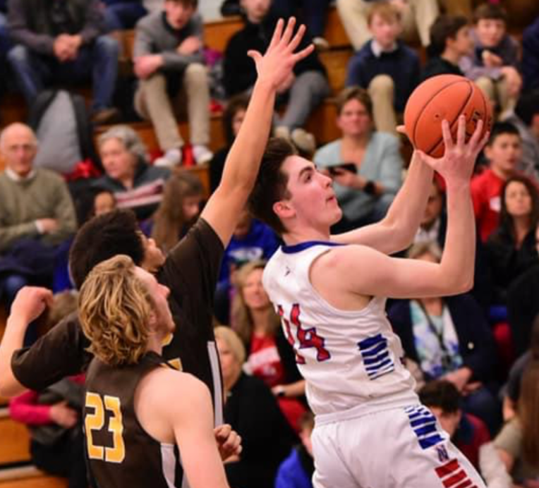 Cosmo Lovig drives toward the basket during a game against Thomaston last season.