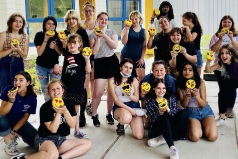 The Nonnewaug High School drama club (pictured) celebrates their hard work with some emoji cookies.