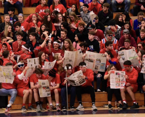 The Nonnewaug High School student section gets hyped up during the red out boys varsity game versus Shepaug High School. This was the rivalry game in March of 2020 just before Covid-19 shut everything down.  (I uploaded this image in the assignment)