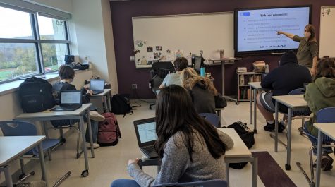 Social studies teacher Rebecca Trzaski addresses a freshman world history class Oct. 27. Trzaski is one opponent of an idea to compensate students for their time in school.