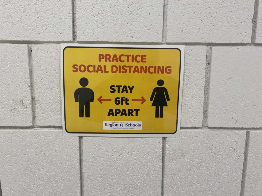 Social distance signs at Nonnewaug High School are urging students to stay 6 feet apart. 