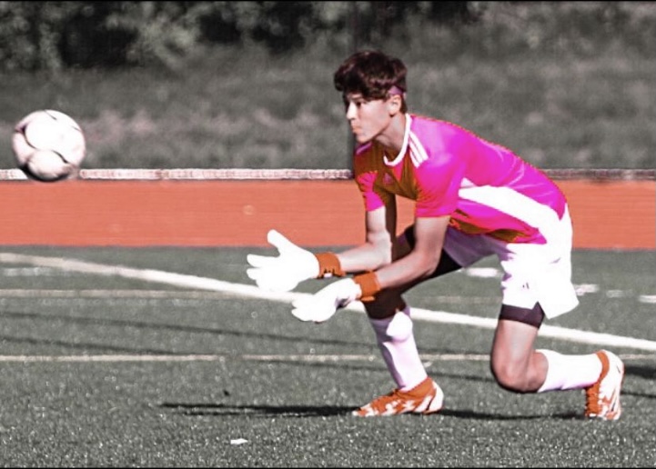 Nonnewaug goalie Dylan Chung, makes a diving save, one of many key plays the junior keeper made throughout the teams historic 2021 run. 