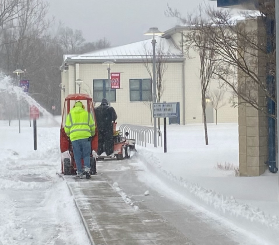 Clearing snow from Nonnewaugs sidewalks is one of many behind-the-scenes jobs that the schools custodians perform.