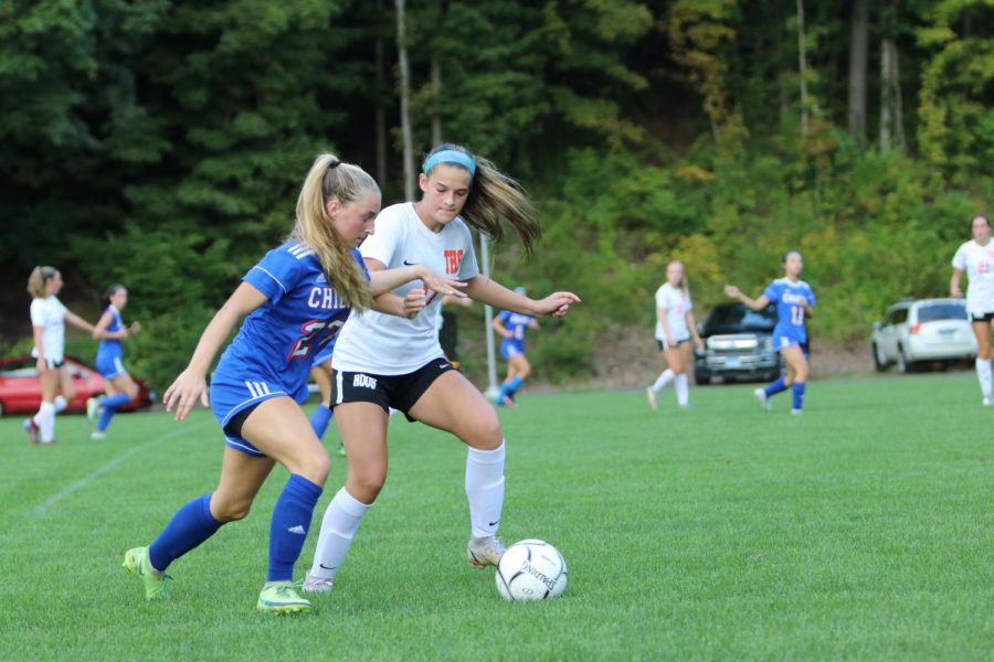 Nonnewaug senior Lauren Pabst dribbles around a Terryville defender during their Sept. 13 game at Nonnewaug.