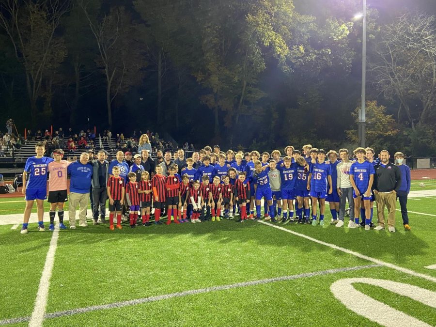 Three eras of Nonnewaug soccer game together to celebrate the anniversary of the 2002 state championship team. 