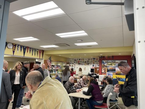 Veterans eating breakfast together after the Veterans Day ceremony Nov. 9 concluded in NHS’s College and Career Resource Center, allowing veterans to tell stories and come together.
