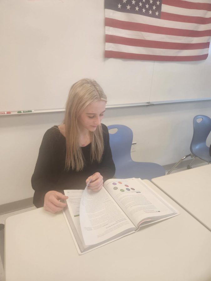 Nonnewaug sophomore Caitlin Johnson is the only underclassman in the AP Government and Politics class.
