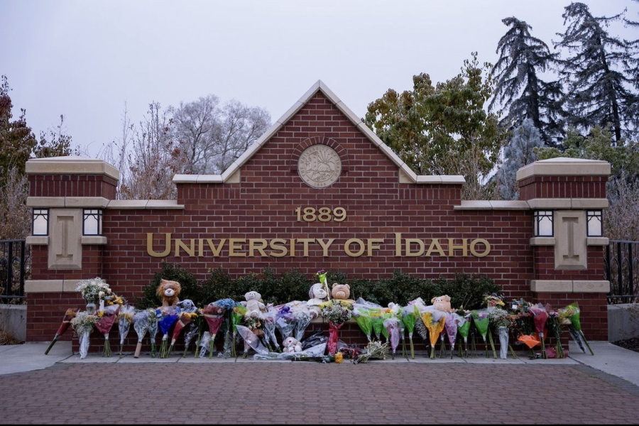 Memorial flowers and gifts line the University of Idaho entrance to mourn the four students who were stabbed to death in November. The killer has not been identified.