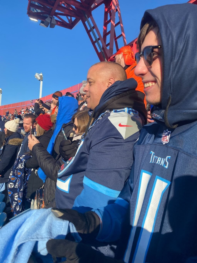 Cuccia and his family take in a Titans playoff game last year. 