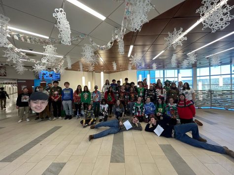 Nonnewaug students and staff members who wore ugly sweaters on the Tuesday before holiday break gathered in the lobby for a photo.