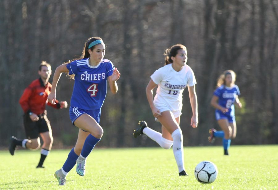 Layla Coppola dribbles during the Chiefs Class L tournament game against Ellington. Coppola was named All-State in her first season at Nonnewaug.