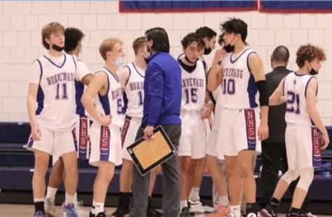 Nonnewaugs boys basketball team is one of many teams captured in photos by Noreen Chung, the mom of three student-athletes.