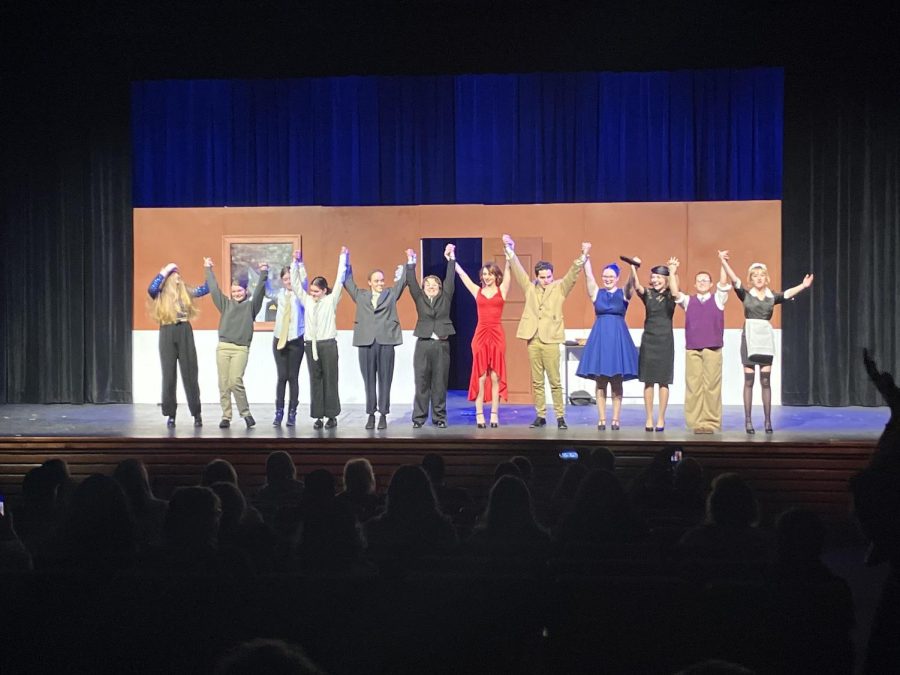 The cast of Clue takes its curtain call after the Dec. 8 performance at Nonnewaug.