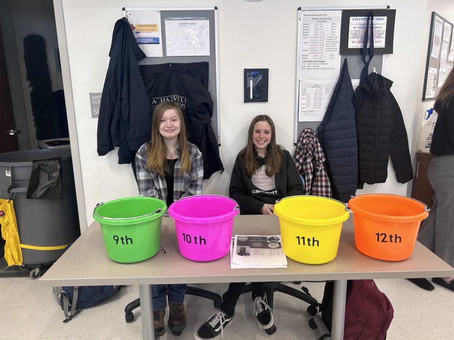 Freshman FFA members Tess Cuccia, left, and Cheyanne Tilley were among the volunteers to work the 2023 K9 Penny Wars. (Jason Suess)