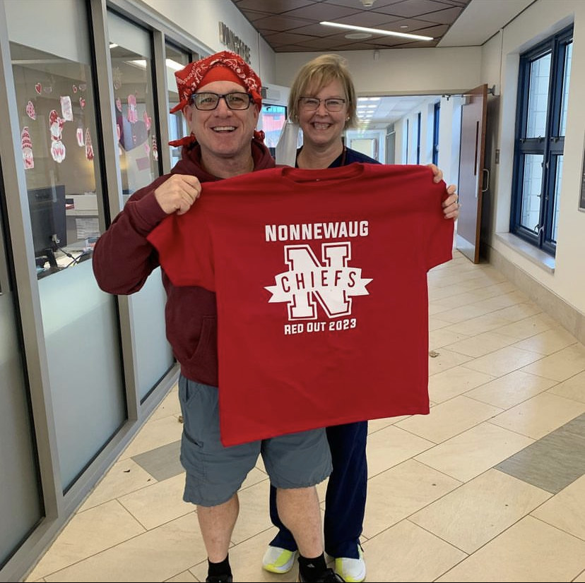 Mr. Green and Mrs. Snabaitis support the Leukemia and Lymphoma society, buying their Red-Out for the week. Including bandanna, t-shirts, and bracelets. 