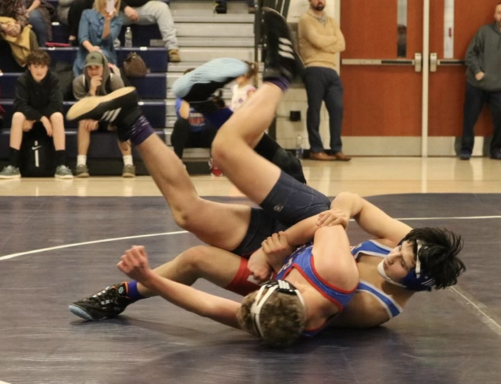 Jack+Wendel+takes+down+an+opponent+during+a+182-pound+match+this+season.+Wendel+won+his+second+straight+Class+S+state+championship.
