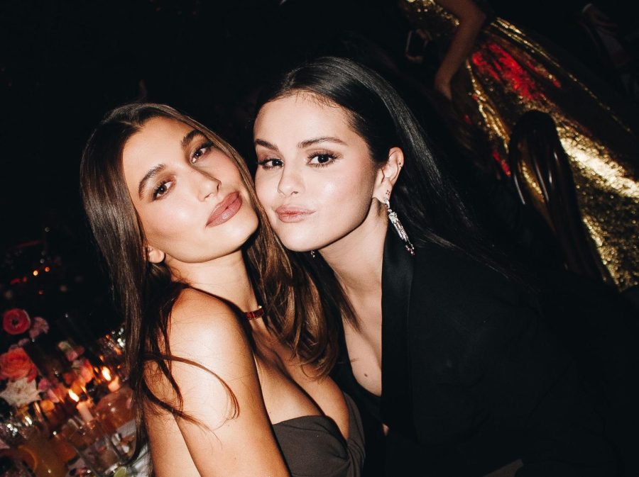 Hailey Beiber (left) and Selena Gomez (right) pose together at the Academy Museum Gala. 