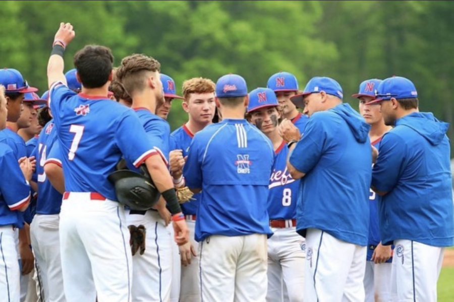 Nonnewaug’s baseball team huddles before a game last season. The Chiefs won the Berkshire League title last season for the first time in two decades.