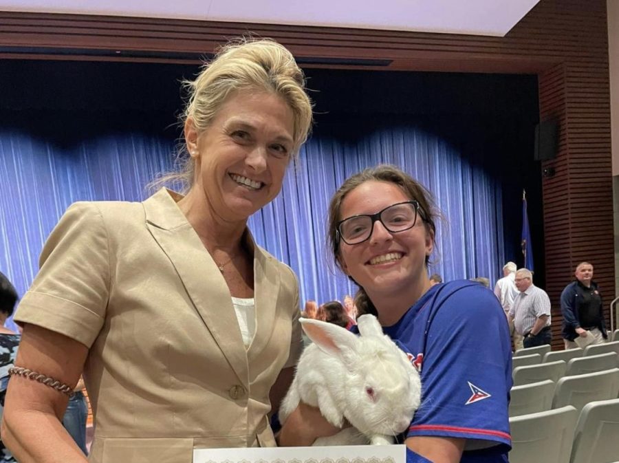 After juggling between school, an MBLE presentation, softball game and awards ceremony, Madelynn Orosz poses with Principal Pam Sordi and Harlow the rabbit, dubbed Mr. Harlow by Sordi.