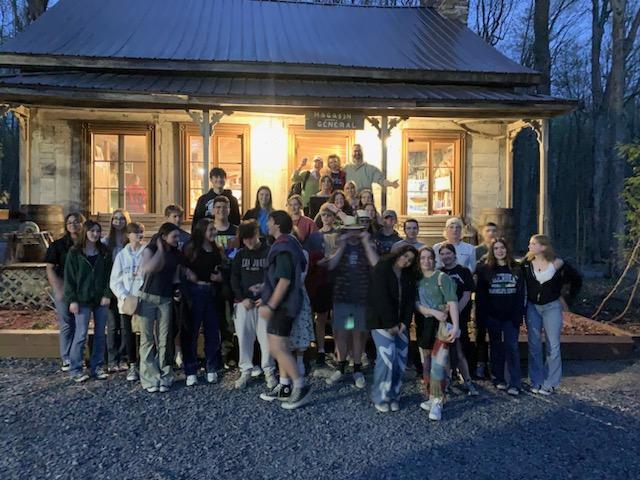 French students on Nonnewaugs trip to Montreal pose outside the sugar shack.