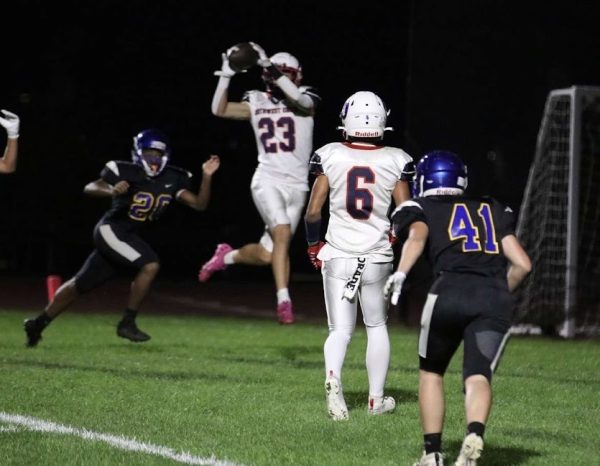 Northwest United junior wide receiver Reed Woerner, from Shepaug, catches the ball while playing Sept. 15 against VGW Tech. The Workhorses won, 39-0. 