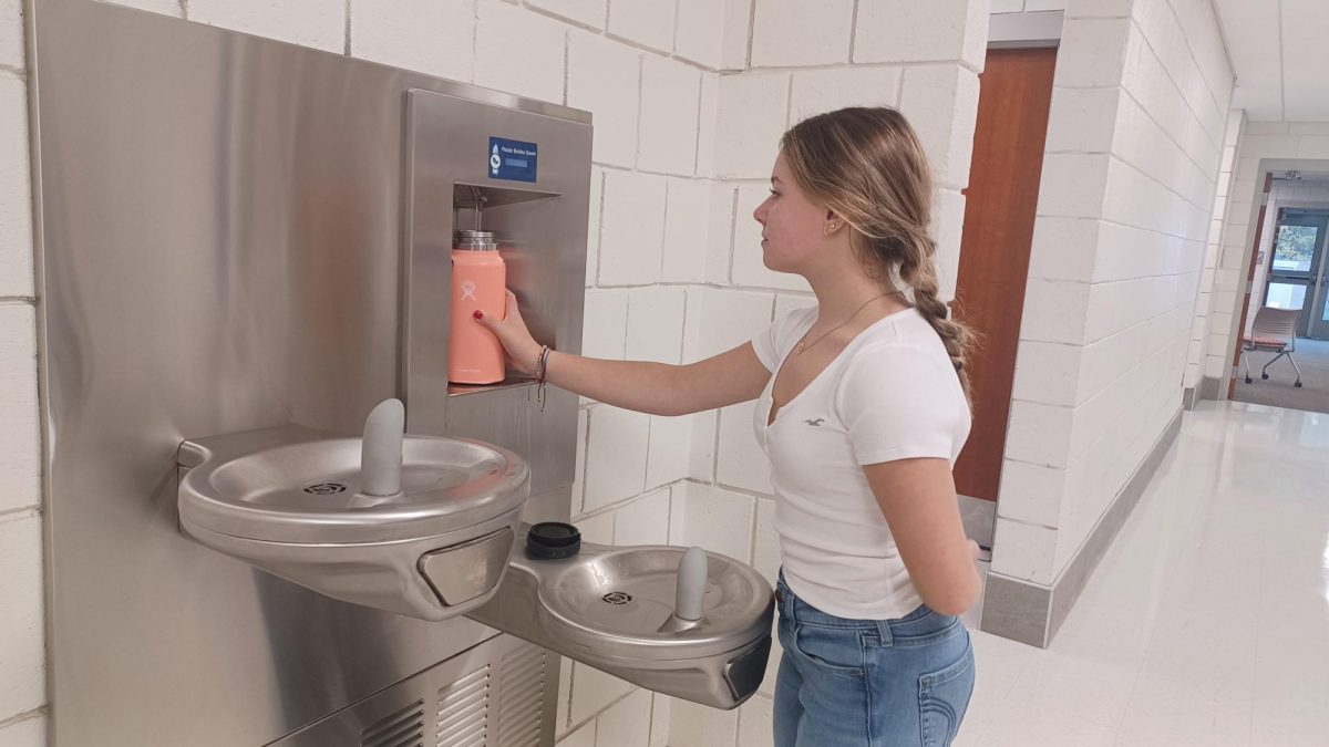 Freshman Morgan Willis fills up a water bottle from the bottle filler near the gym Oct. 20. This is one of the more preferred water fountains by students. 