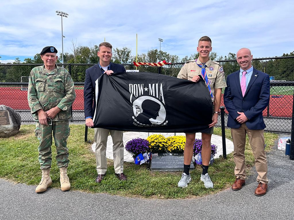 Mykal+Kuslis%2C+right%2C+attends+a+ceremony+for+Nonnewaugs+POW-MIA+memorial+with%2C+from+right%2C+junior+Andrew+Grivner%2C+superintendent+Brian+Murphy%2C+and+local+veteran+Bud+Neal.+%28Courtesy+of+Nonnewaug+High+School%2FInstagram%29