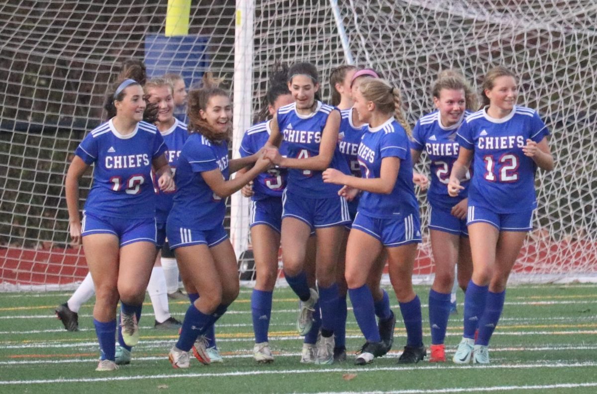 The Nonnewaug girls soccer team celebrates a goal in the 2022 Berkshire League championship against Thomaston. This years league semifinals are on Halloween, which is a disappointment to some players.