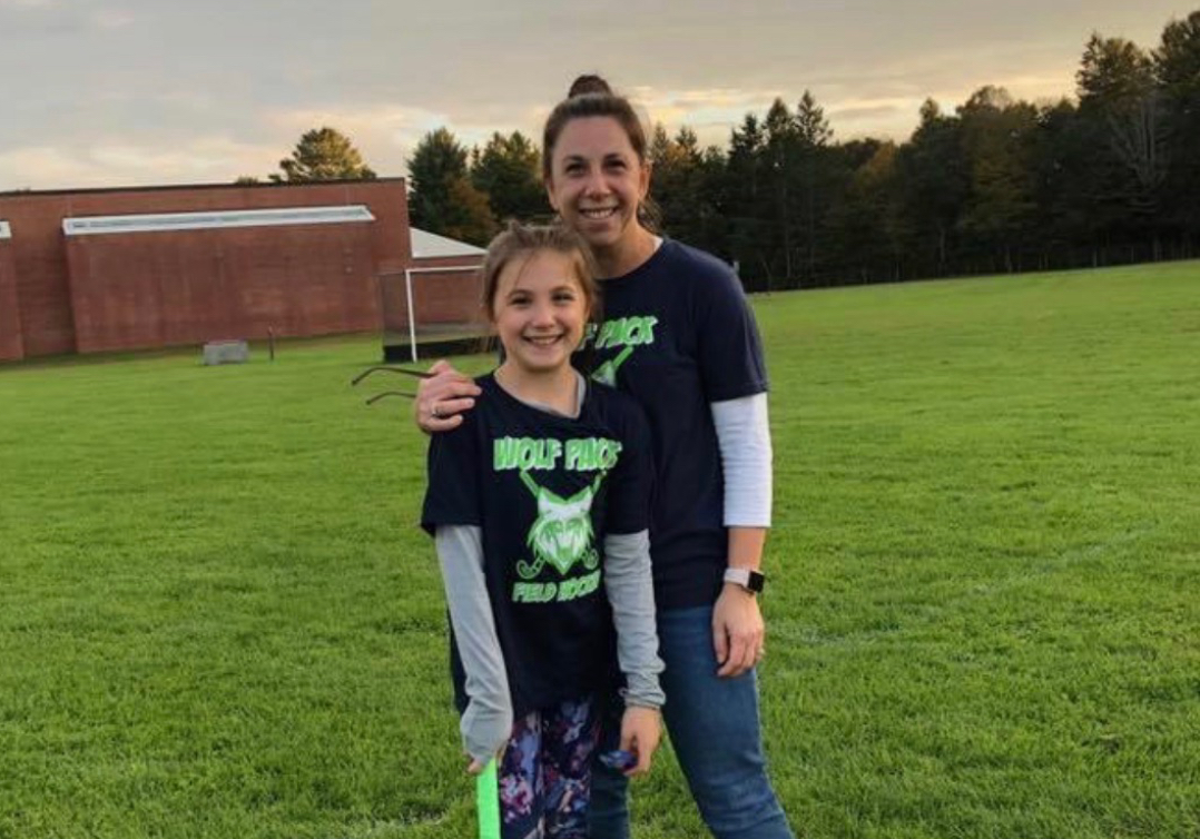 Anna Crocker, left, poses with her mom, Janet, after a youth field hockey game. Janet, now in her first season as Nonnewaugs head coach, once again coaches Anna, a sophomore on the team. (Contributed by Janet Crocker)