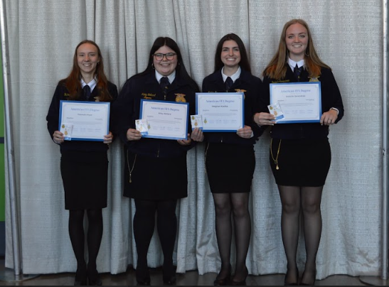 American Degree representatives of the Woodbury FFA, from left, Hannah Pryor, Riley Ballard, Meghan Kostka, Isabelle Sarandrea show off their achievements at the 2022 National FFA Convention. (Tom DiMarco)