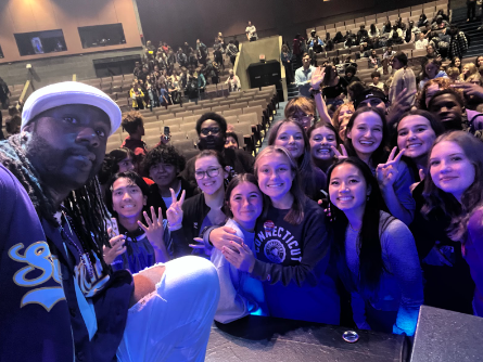 Flo Franco(left) takes a selfie with Nonnewaug french students at his concert  in the SCSU Lyman Hall auditorium. 