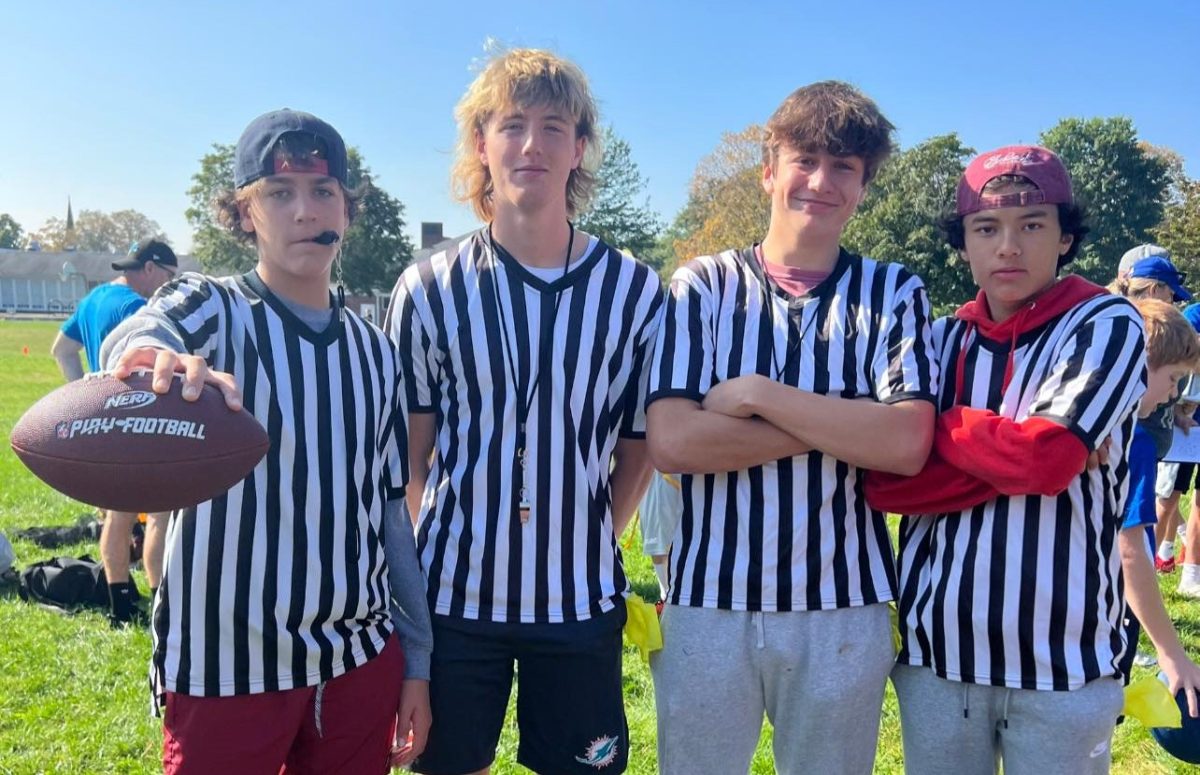 Nonnewaug senior Ben Roden, second from left, is not only Northwest Uniteds starting quarterback but also a youth flag football referee. He says the experience has changed his perception of officials during his own games.