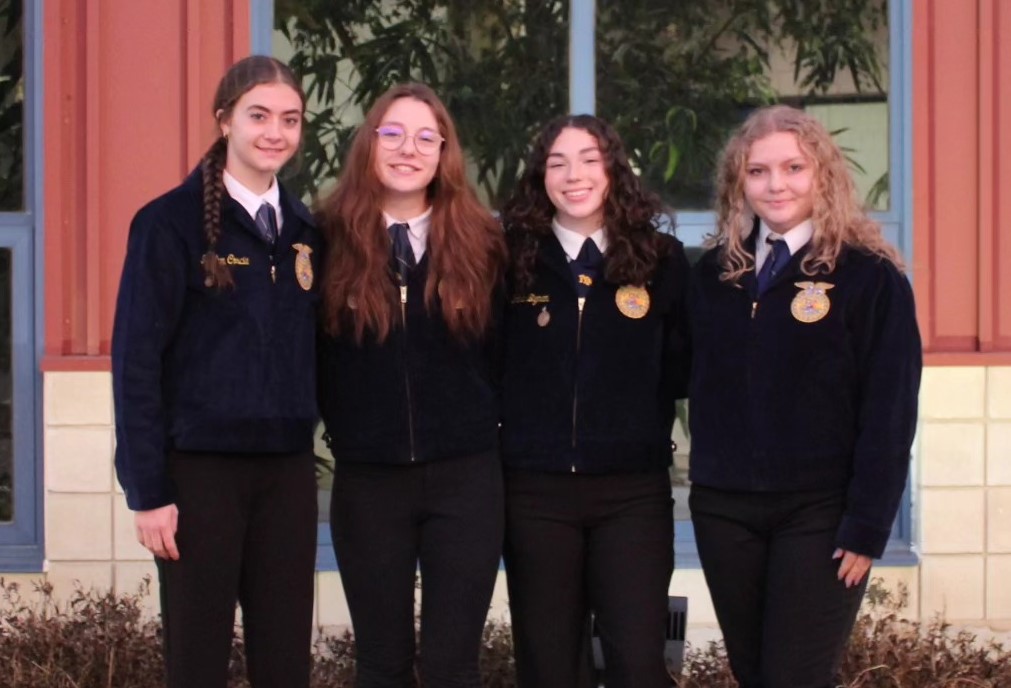 Nonnewaug sophomore Jocelyn Coscia, left, finished first in the Connecticut FFA horse evaluation competition this fall. (Woodbury FFA)