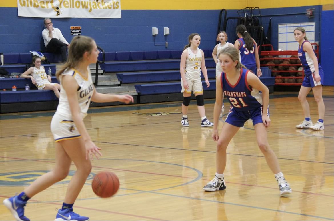 McKenna Hardisty (21) plays defense during a JV basketball game last season. Hardisty is a starting guard this year as a sophomore.