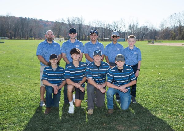 This past fall, Ryan Campanario, back left, finished coaching his eighth year on the Nonnewaug golf team. The Nonnewaug golf team has been among the top five teams in the Berkshire League since Campanario stepped in as a coach. (Courtesy of the Nonnewaug Yearbook)