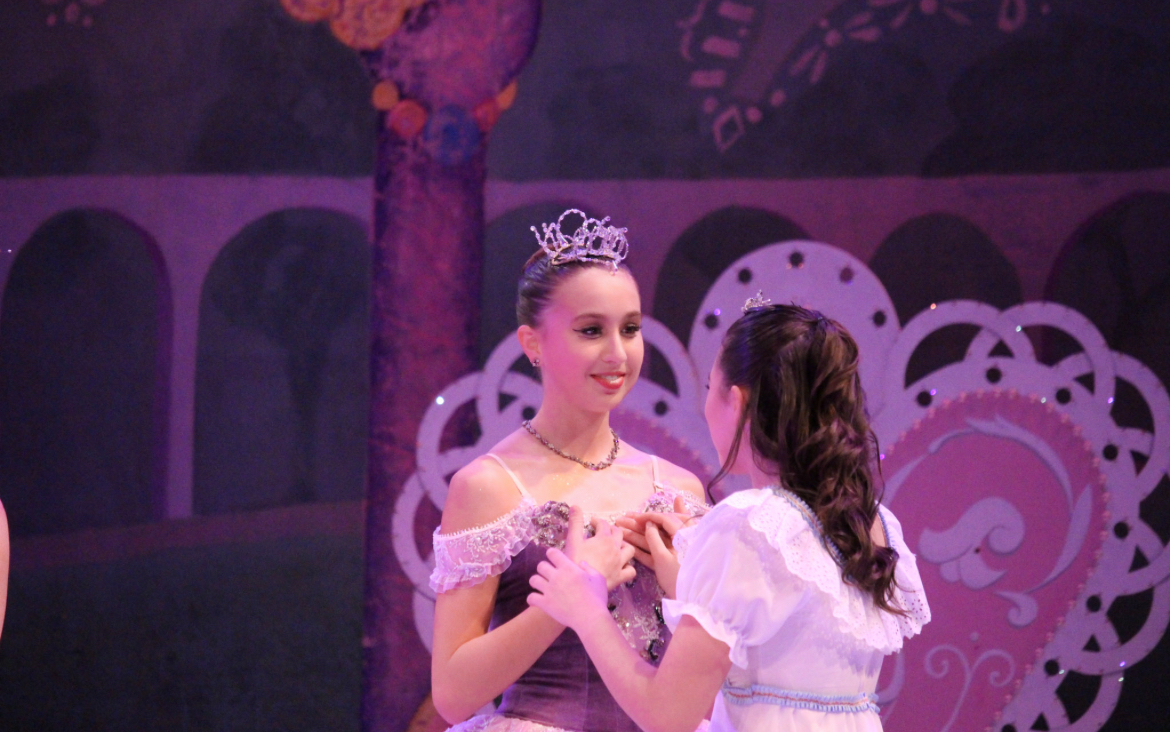 Main Street Ballet dancers Anna Crocker, right, and Anna Walkup talk to each other at dress rehearsal Dec. 15. They have been dancing together since 2018. (Courtesy of Main Street Ballet)