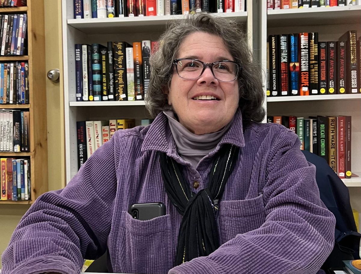 Kathy Doyle, deputy registrar, and Friend of the Library, and member of the Sidewalk Board, does much around the town of Woodbury, including ensuring voting accessibility for town residents. 