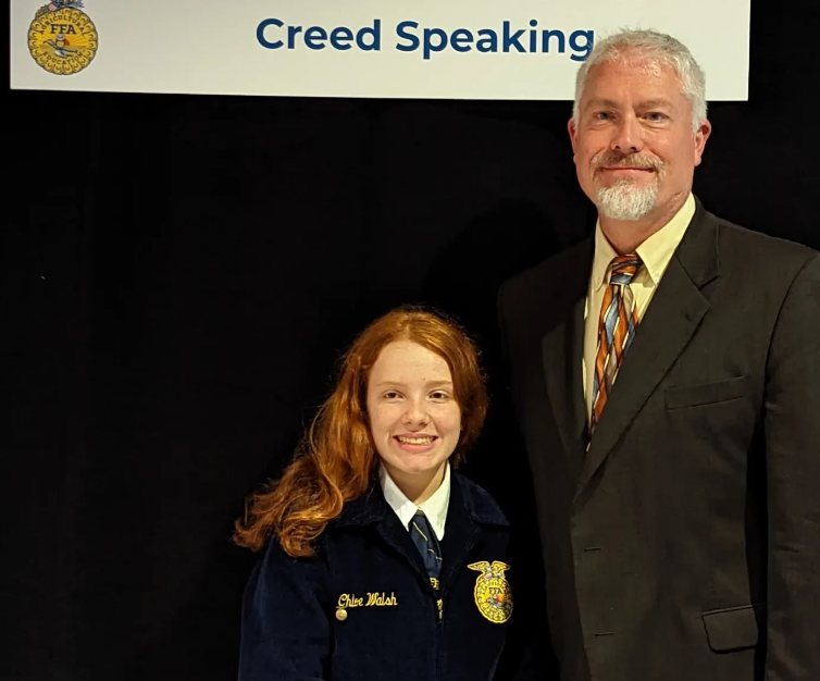 Being recognized on the national FFA stage in Indianapolis alongside agriscience faculty Eric Birkenberger serves as a culmination of Chloe Walshs work at NHS. 