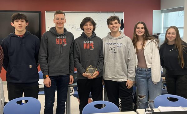 From left, juniors Liam Sandor, Andrew Grivner, Gavin Sandor, Noah Sapack, Katie Farrell, and Lily Kiernan pose after starring in the informational video promoting the STALL fundraiser for the Leukemia and Lymphoma Society. (Courtesy of Karen Sandor)