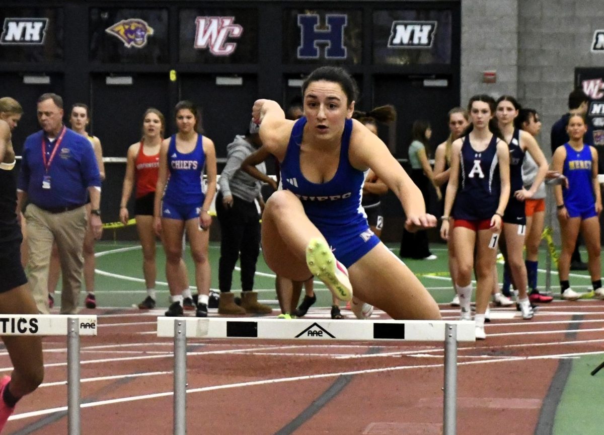 Gianna+Lodice%2C+a+Nonnewaug+senior%2C+runs+the+55-meter+hurdles+at+the+Last+Chance+Qualifier+meet+Feb.+5+at+the+Floyd+Little+Athletic+Center+in+New+Haven.