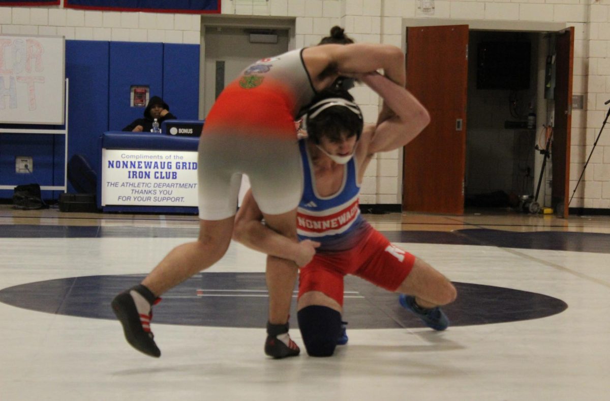 Nonnewaugs Jeff Bernardi starts to flip his opponent onto the mat, gearing up for another pinfall Feb. 7 against Derby/Oxford/Holy Cross.
