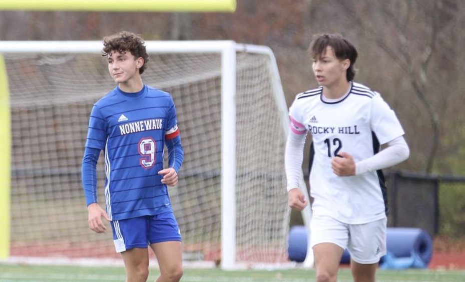 Nonnewaugs+Nick+Higgins+%289%29+competes+against+Rocky+Hill+in+the+Class+M+boys+soccer+quarterfinals+in+November.+Higgins+was+one+of+the+Chiefs+captains+as+a+senior.+%28Courtesy+of+Nonnewaug+Boys+Soccer%2FFacebook%29