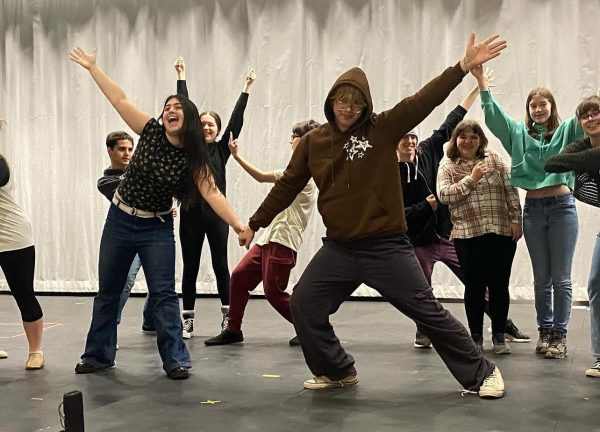 Dominik Udvardi, front right, and Gianna Ruby-Dasilva, left, pose after finishing one of the first musical rehearsals in the play, Once Upon A Mattress. (Courtesy of NHS Drama Club/Instagram)