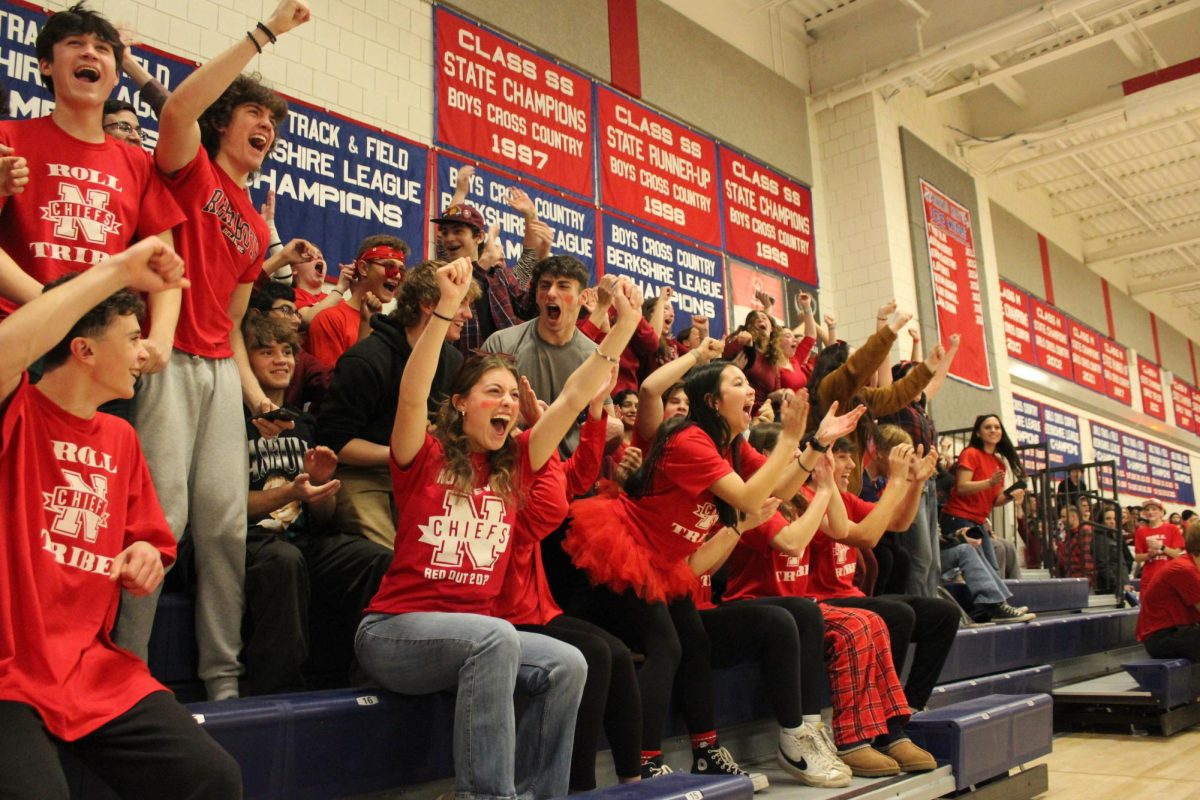 The junior class cheers after the announcement that they were the winners of Nonnewaug’s winter pep rally Feb. 2.