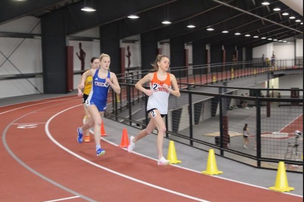 Senior Julianna Bellagamba settles in during the first half of the mile at the Bethel High School indoor track facility. (Courtesy of Nonnewaug track and field/Instagram)
