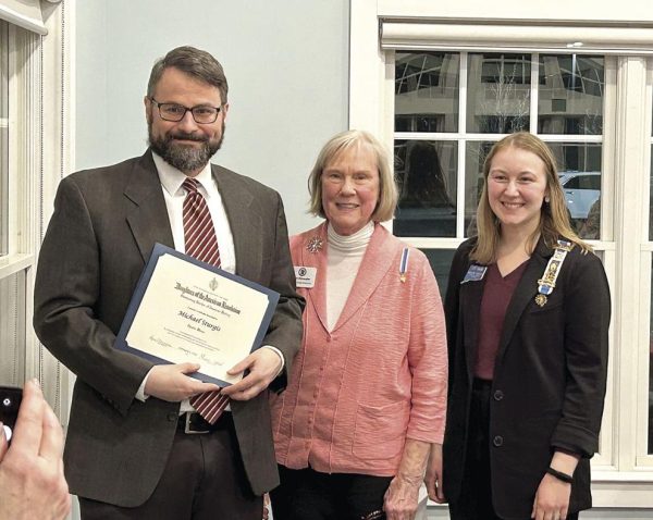 Nonnewaug history teacher Michael Sturges, left, poses with representatives of the Daughter of the American Revolution chapter that recognized him with the Outstanding Teacher of American History award in February. (Courtesy of the Trumbull-Porter Chapter of the DAR)